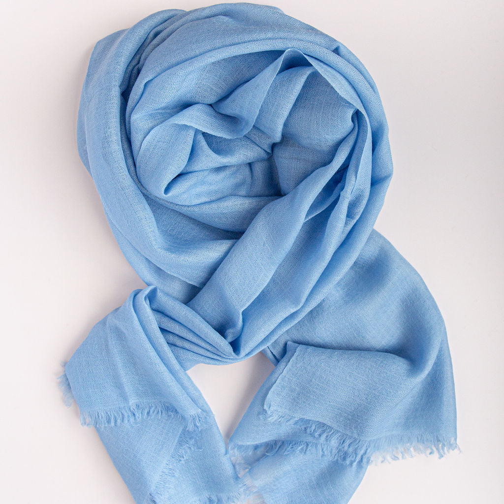 Light blue scarf on a white background